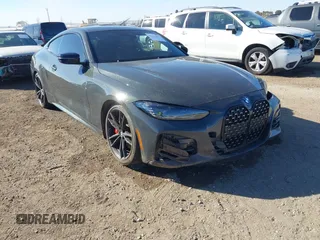 2022 BMW 4 Series 430i with VIN WBA53AP0XNCJ50015, listed as a IAAI auction lot 41313087 with 70,816 mi miles and . Bid and sale history available at carsss.com. Image 1.