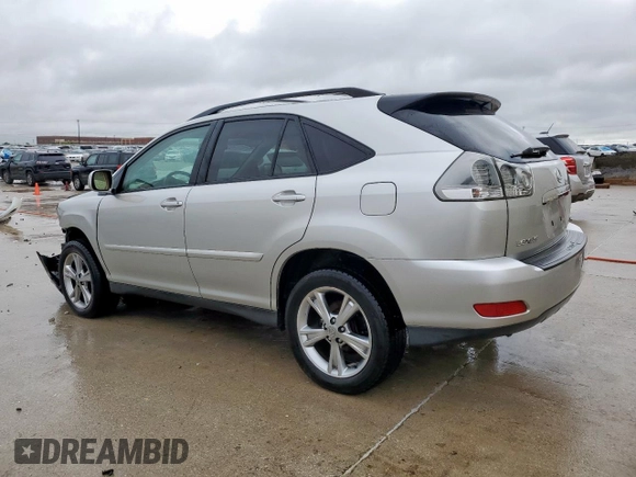 2006 Lexus RX 400h with VIN JTJGW31U762000555, listed as a Copart auction lot 54873185 with 191,579 mi miles and Salvage title. Bid and sale history available at DreamBid. Image 2.