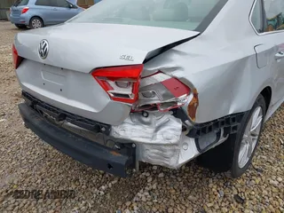 2012 Volkswagen Passat SEL with VIN 1VWCP7A34CC079912, listed as a IAAI auction lot 41993331 with 114,110 mi miles. Bid and sale history available at carsss.com. Image 6.