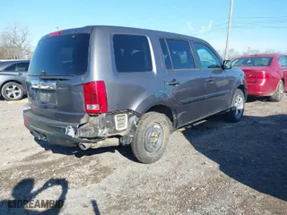 2014 Honda Pilot EX-L with VIN 5FNYF3H59EB026317, listed as a IAAI auction lot 41820951 with 209,440 mi miles. Bid and sale history available at carsss.com. Image 4.