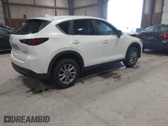 2023 Mazda CX-5 2.5 S with VIN JM3KFBAMXP0153362, listed as a IAAI auction lot 41875188 with 57,648 mi miles. Bid and sale history available at carsss.com. Image 4.