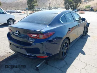 2021 Mazda 3 S with VIN JM1BPAALXM1326956, listed as a IAAI auction lot 42304248 with 55,104 mi miles and . Bid and sale history available at DreamBid. Image 4.