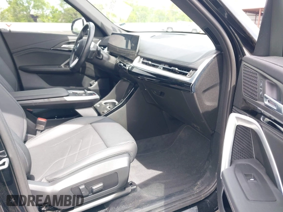 2023 BMW X1 xDrive28i with VIN WBX73EF03P5W15295, listed as a IAAI auction lot 42071192 with 23,326 mi miles and . Bid and sale history available at DreamBid. Image 5.