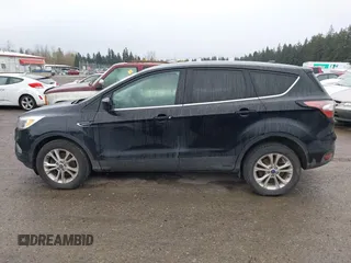 2017 Ford Escape SE with VIN 1FMCU9GD9HUB45195, listed as a IAAI auction lot 41916930 with 126,084 mi miles. Bid and sale history available at carsss.com. Image 14.
