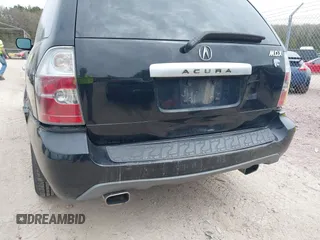 2004 Acura MDX Touring Pkg with VIN 2HNYD18694H551917, listed as a IAAI auction lot 42130100 with 207,699 mi miles. Bid and sale history available at carsss.com. Image 6.