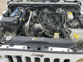 2018 Jeep Wrangler JK Unlimited Sport with VIN 1C4BJWDG6JL886776, listed as a Copart auction lot 43754455 with 105,575 mi miles and Clean Title. Bid and sale history available at carsss.com. Image 12.
