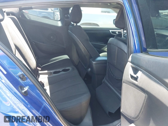 2013 Hyundai Veloster w/Gray Int z VIN KMHTC6AD3DU134956, wystawiony jako IAAI lot #42560944 z przebiegiem 108 166 mil mil oraz . Historia ofert i sprzedaży dostępna na DreamBid. Obrazek 8.