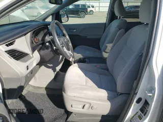 2015 Toyota Sienna LE with VIN 5TDJK3DC2FS126466, listed as a Copart auction lot 61165105 with 56,634 mi miles and Salvage title. Bid and sale history available at DreamBid. Image 7.