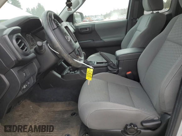2023 Toyota Tacoma SR with VIN 3TYRX5GN9PT089239, listed as a Copart auction lot 56184205 with 13,653 mi miles and Salvage title. Bid and sale history available at DreamBid. Image 7.