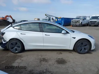 2022 Tesla Model 3 with VIN 5YJ3E1EA1NF167711, listed as a IAAI auction lot 41594266 with 50,554 mi miles and . Bid and sale history available at DreamBid. Image 13.