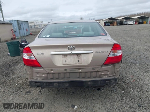 2002 Toyota Camry LE z VIN 4T1BE32K72U028489, wystawiony jako IAAI lot #41760604 z przebiegiem 163 950 mil mil oraz . Historia ofert i sprzedaży dostępna na DreamBid. Obrazek 17.