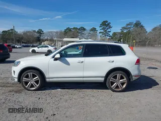 2016 Volkswagen Touareg Sport with VIN WVGEF9BP5GD012680, listed as a IAAI auction lot 41610943 with 153,952 mi miles and . Bid and sale history available at DreamBid. Image 14.