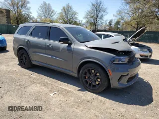 2023 Dodge Durango R/T Plus with VIN 1C4SDJCT2PC559230, listed as a Copart auction lot 53747975 with 22,765 mi miles and Salvage title. Bid and sale history available at DreamBid. Image 4.