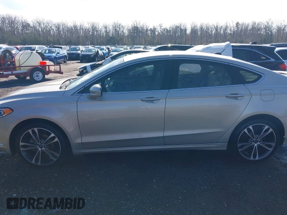 2017 Ford Fusion Titanium with VIN 3FA6P0K91HR309740, listed as a IAAI auction lot 41373824 with 95,499 mi miles and . Bid and sale history available at DreamBid. Image 15.