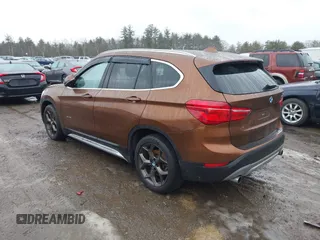 2016 BMW X1 xDrive28i with VIN WBXHT3C31GP881488, listed as a IAAI auction lot 41693116 with 120,922 mi miles. Bid and sale history available at carsss.com. Image 3.