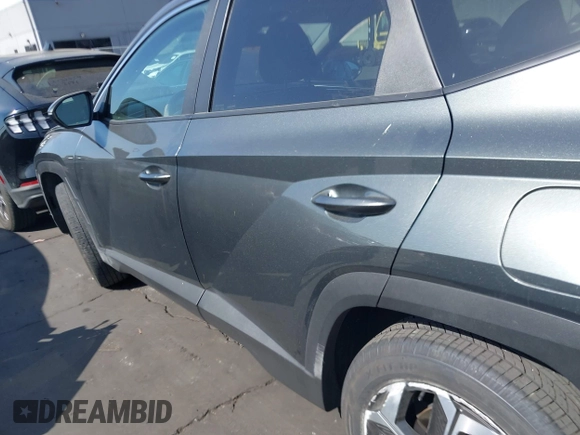 2022 Hyundai Tucson SEL z VIN 5NMJF3AE6NH133724, wystawiony jako IAAI lot #42309502 z przebiegiem 49 156 mil mil oraz . Historia ofert i sprzedaży dostępna na DreamBid. Obrazek 14.