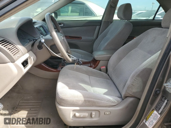 2004 Toyota Camry LE with VIN 4T1BE32K74U884720, listed as a Copart auction lot 49534195 with 253,516 mi miles and Salvage Title. Bid and sale history available at DreamBid. Image 7.