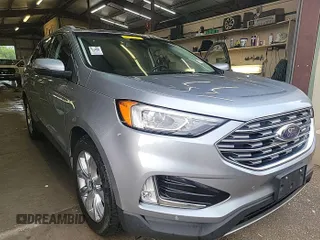 2020 Ford Edge Titanium z VIN 2FMPK4K90LBA30691, wystawiony jako IAAI lot #42339579 z przebiegiem 86 375 mil mil oraz . Historia ofert i sprzedaży dostępna na DreamBid. Obrazek 1.