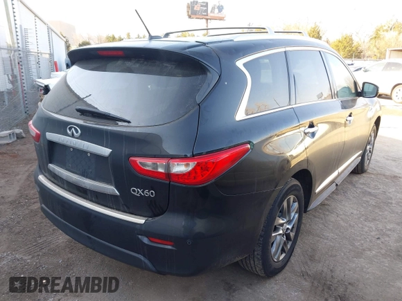 2015 Infiniti QX60 with VIN 5N1AL0MM1FC542896, listed as a IAAI auction lot 41673442 with 138,458 mi miles. Bid and sale history available at carsss.com. Image 4.