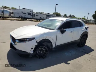 2022 Mazda CX-30 S Select with VIN 3MVDMBBL5NM423944, listed as a Copart auction lot 58593165 with 88,588 mi miles and Salvage title. Bid and sale history available at DreamBid. Image 1.