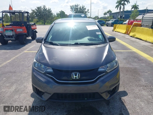 2015 Honda Fit EX-L z VIN 3HGGK5H89FM730013, wystawiony jako IAAI lot #42673309 z przebiegiem 142 660 mil mil oraz . Historia ofert i sprzedaży dostępna na DreamBid. Obrazek 12.