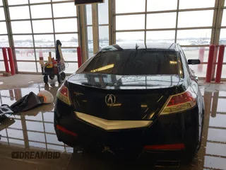2009 Acura TL Tech with VIN 19UUA86549A010863, listed as a IAAI auction lot 41001252 with 186,441 mi miles. Bid and sale history available at carsss.com. Image 16.