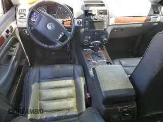 2004 Volkswagen Touareg z VIN WVGCM77L74D059969, wystawiony jako Copart lot #68238193 z przebiegiem Nie podano mil oraz Szkody całkowita. Historia ofert i sprzedaży dostępna na DreamBid. Obrazek 8.