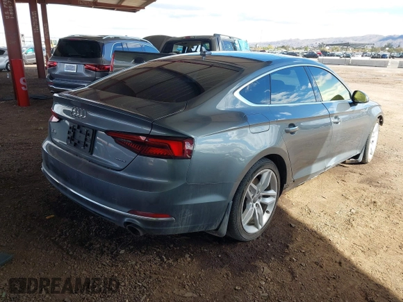 2019 Audi A5 Sportback Premium with VIN WAUANCF51KA060972, listed as a IAAI auction lot 41783485 with 98,456 mi miles. Bid and sale history available at carsss.com. Image 4.
