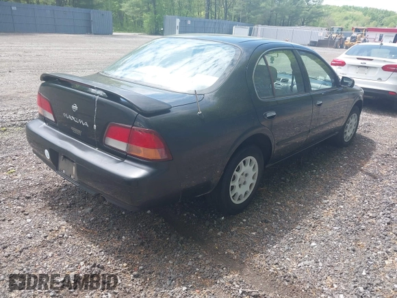 1998 Nissan Maxima GXE with VIN JN1CA21D2WM923835, listed as a IAAI auction lot 42221419 with 256,441 mi miles and . Bid and sale history available at DreamBid. Image 4.