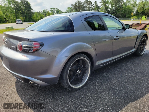 2004 Mazda RX-8 with VIN JM1FE173040113082, listed as a IAAI auction lot 42122741 with 62,483 mi miles. Bid and sale history available at carsss.com. Image 3.