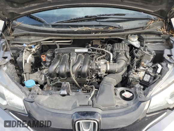 2015 Honda Fit EX-L z VIN 3HGGK5H80FM701807, wystawiony jako Copart lot #53103495 z przebiegiem 95 224 mil mil oraz Szkoda całkowita • Salvage title. Historia ofert i sprzedaży dostępna na DreamBid. Obrazek 11.