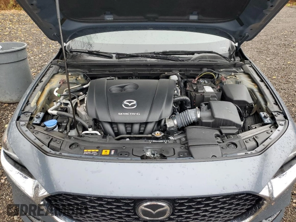 2022 Mazda 3 Premium with VIN 3MZBPADLXNM306199, listed as a Copart auction lot 77423574 with Not Provided miles and Non Repairable. Bid and sale history available at DreamBid. Image 11.