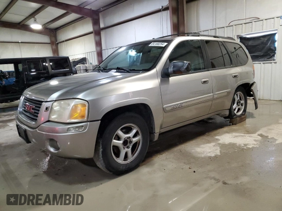 2002 GMC Envoy SLE with VIN 1GKDS13S622135607, listed as a Copart auction lot 84100254 with 298,811 mi miles and Salvage Title. Bid and sale history available at carsss.com. Image 1.