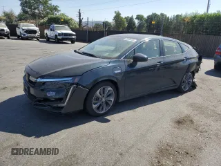 2018 Honda Clarity Plug-In Hybrid Touring with VIN JHMZC5F33JC016429, listed as a Copart auction lot 66938434 with 65,291 mi miles and Salvage Title. Bid and sale history available at carsss.com. Image 1.