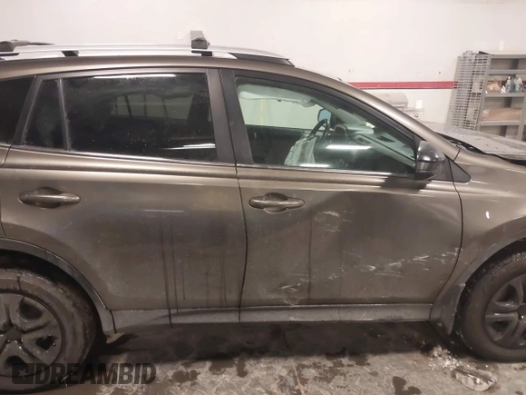 2014 Toyota RAV4 LE with VIN 2T3BFREV3EW140059, listed as a IAAI auction lot 41613214 with 168,165 mi miles and . Bid and sale history available at DreamBid. Image 13.