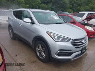 2018 Hyundai Santa Fe 2.4L with VIN 5XYZT3LB0JG523902, listed as a IAAI auction lot 42451414 with 64,475 mi miles and . Bid and sale history available at DreamBid. Image 1.
