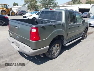 2002 Ford Explorer Sport Trac Value with VIN 1FMZU67E72UB55460, listed as a IAAI auction lot 42677446 with 148,794 mi miles and . Bid and sale history available at DreamBid. Image 4.