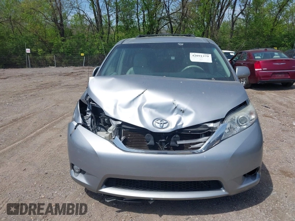2014 Toyota Sienna XLE with VIN 5TDYK3DC9ES413283, listed as a IAAI auction lot 42091379 with 184,506 mi miles and . Bid and sale history available at DreamBid. Image 12.