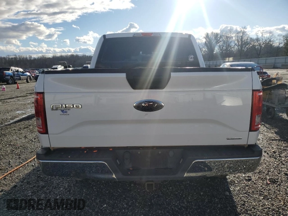 2015 Ford F-150 XLT with VIN 1FTEW1EF4FFC63153, listed as a Copart auction lot 87228144 with 105,160 mi miles and Salvage Title. Bid and sale history available at carsss.com. Image 6.