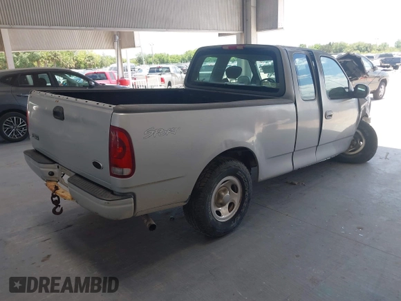 2003 Ford F-150 XL with VIN 1FTRX17213NB36760, listed as a IAAI auction lot 42170424 with 130,768 mi miles and . Bid and sale history available at DreamBid. Image 4.