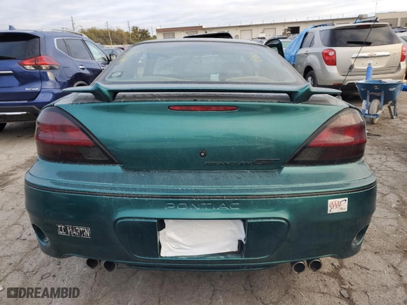 1999 Pontiac Grand Am GT with VIN 1G2NW12E5XM841080, listed as a Copart auction lot 75167674 with NaN miles and Salvage Title. Bid and sale history available at carsss.com. Image 6.