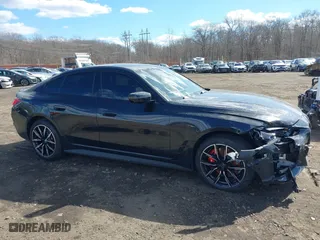2024 BMW i4 xDrive40 with VIN WBY83FB04RFT19615, listed as a IAAI auction lot 41679918 with 3,883 mi miles. Bid and sale history available at carsss.com. Image 13.