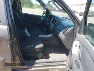 2005 Mazda Tribute S with VIN 4F2YZ04125KM04568, listed as a IAAI auction lot 41973671 with 244,117 mi miles and . Bid and sale history available at carsss.com. Image 5.