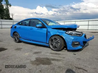 2021 BMW 2 Series 228i with VIN WBA53AK00M7J43699, listed as a Copart auction lot 55928355 with 86,544 mi miles and Salvage title. Bid and sale history available at DreamBid. Image 4.