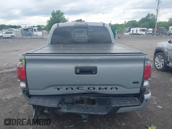2021 Toyota Tacoma SR with VIN 5TFCZ5AN3MX258746, listed as a IAAI auction lot 42252967 with 62,095 mi miles and . Bid and sale history available at DreamBid. Image 16.