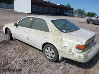 2000 Toyota Camry CE with VIN JT2BG22K3Y0471420, listed as a IAAI auction lot 42042973 with 1 mi miles. Bid and sale history available at carsss.com. Image 3.