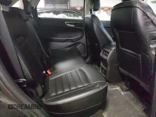 2019 Ford Edge SEL z VIN 2FMPK4J94KBB35458, wystawiony jako Copart lot #44383745 z przebiegiem 184 835 mil mil oraz Szkoda całkowita • Salvage title. Historia ofert i sprzedaży dostępna na DreamBid. Obrazek 11.