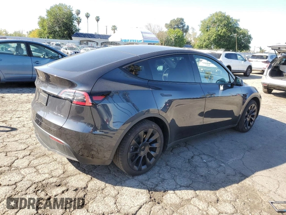 2024 Tesla Model Y Long Range z VIN 7SAYGAEE2RF009616, wystawiony jako Copart lot #46139805 z przebiegiem 6 535 mil mil oraz Szkoda całkowita • Salvage title. Historia ofert i sprzedaży dostępna na DreamBid. Obrazek 3.