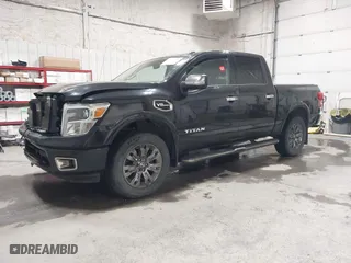 2017 Nissan Titan SV with VIN 1N6AA1E58HN502777, listed as a IAAI auction lot 41612504 with 142,920 mi miles. Bid and sale history available at carsss.com. Image 17.