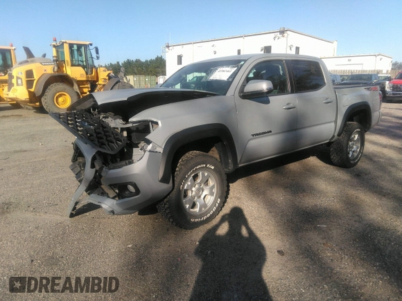 2020 Toyota Tacoma SR5 z VIN 3TMCZ5AN6LM330074, wystawiony jako IAAI lot #41982461 z przebiegiem 43 756 mil mil oraz . Historia ofert i sprzedaży dostępna na DreamBid. Obrazek 18.